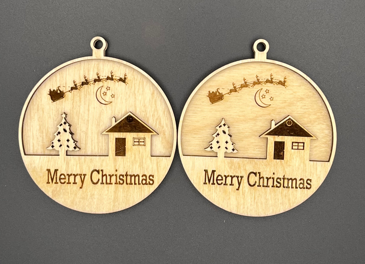 Merry Christmas Ornament Santa sleigh over house