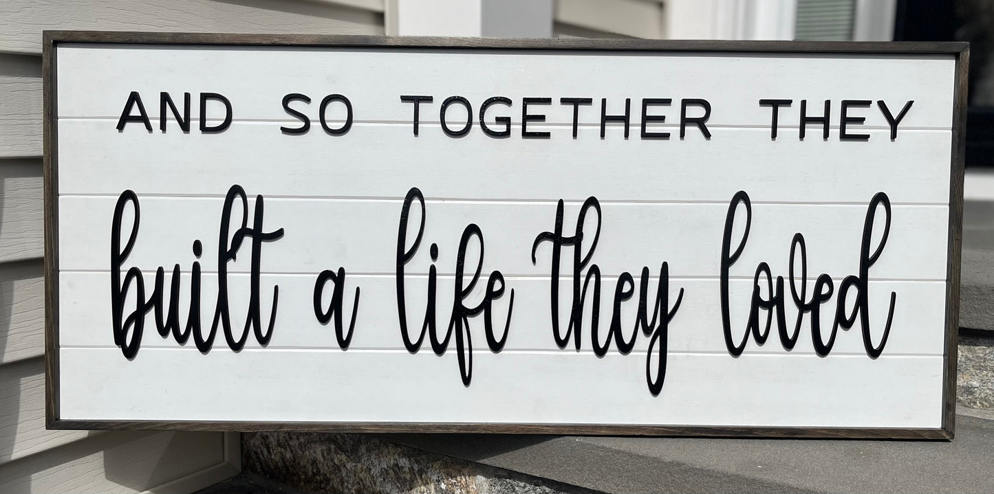 And So Together they Built a Life they Loved sign